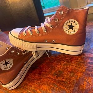Converse high top platform lifts.  Women’s size 9.  Never worn- dusty rose